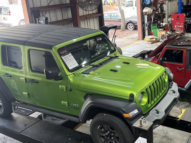 A vehicle being cared for in the shop